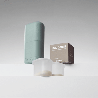 KIIMA Inodore unscented refillable deodorant kit featuring a mint green applicator, a DIY mold and eco-friendly refill pods.