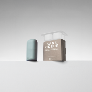 KIIMA Sans odeur refillable lip balm kit featuring a mint green applicator, a DIY mold and eco-friendly refill pods.