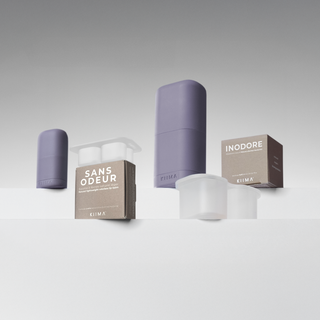 KIIMA refillable lip balm and deodorant, and Sunscented refills on a gray background for DIY skincare lovers.