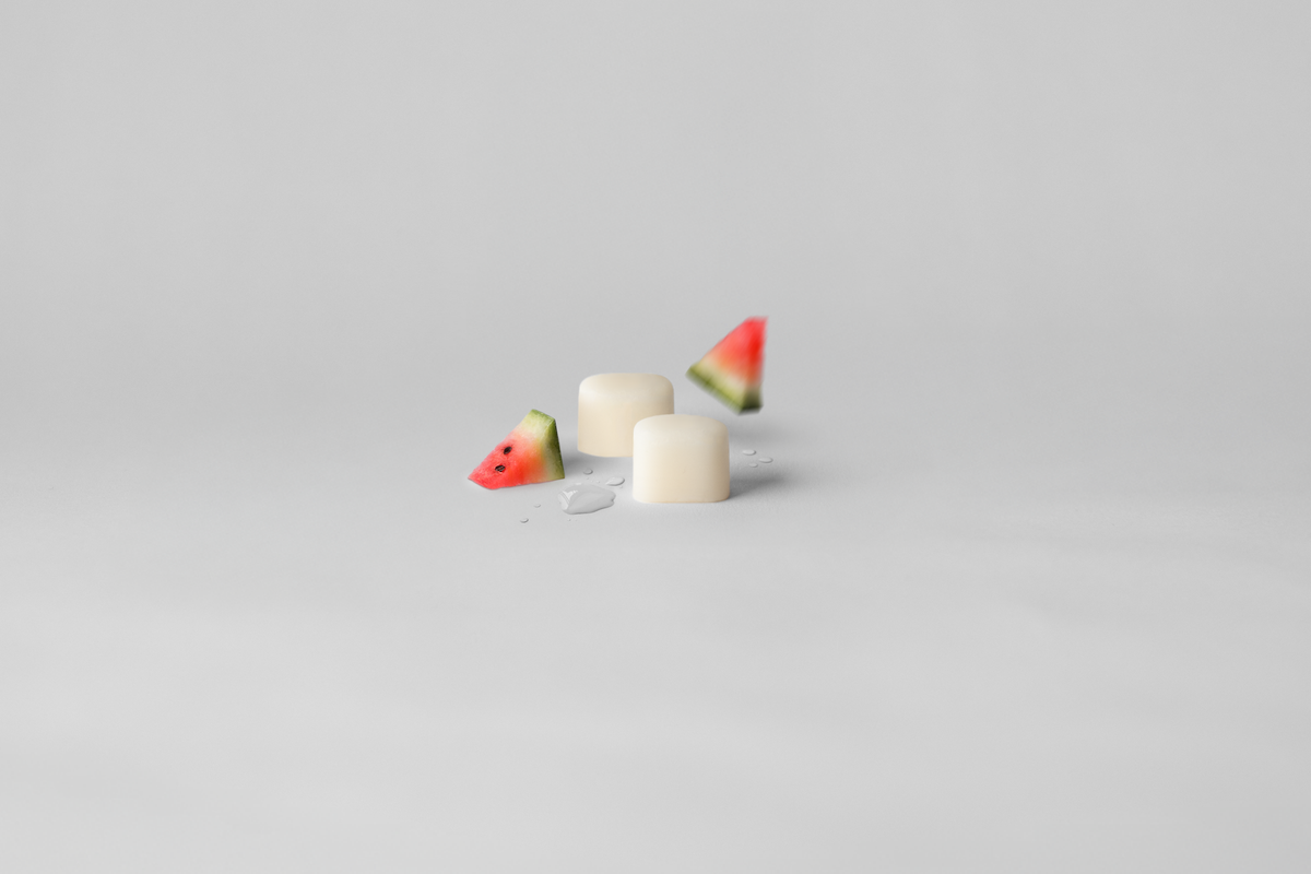 Two KIIMA natural watermelon lip balm refills, eco-friendly lip care packaging