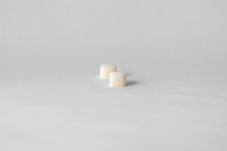 Two KIIMA natural odorless lip balm refills, eco-friendly lip care packaging