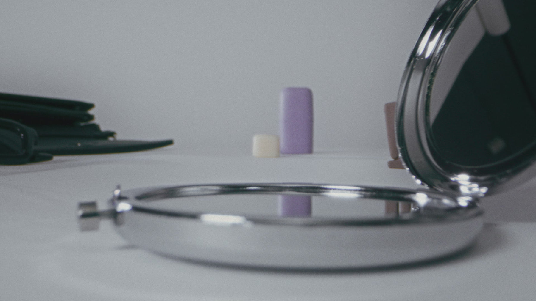 Three models showcase KIIMA's sustainable, refillable personal care collection. The video features close-ups of pastel-colored cases in mint, lilac, and pink, demonstrating product application and highlighting the brand's minimalist, eco-friendly beauty design.