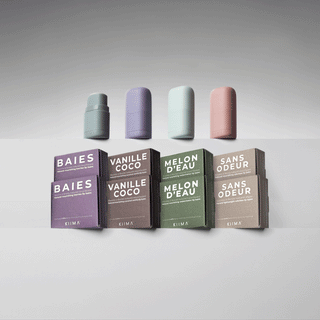 GIF of KIIMA refillable lip balm applicators opening to show natural refills with compostable boxes in Baies, Vanille Coco, and Melon d’Eau.
